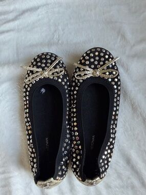 Stuart Weitzman Black Flats with Silver Studs and Metallic Bow